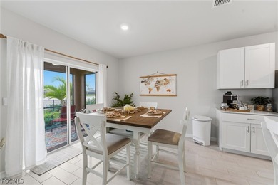 Perfectly positioned to capture tranquil LAKE and FOUNTAIN VIEWS on Herons Glen Golf and Country Club in Florida - for sale on GolfHomes.com, golf home, golf lot