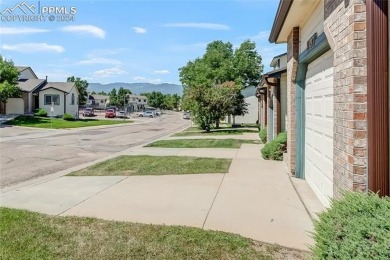 Experience the charm of this delightful end-unit townhome in the on Valley Hi Golf Course in Colorado - for sale on GolfHomes.com, golf home, golf lot