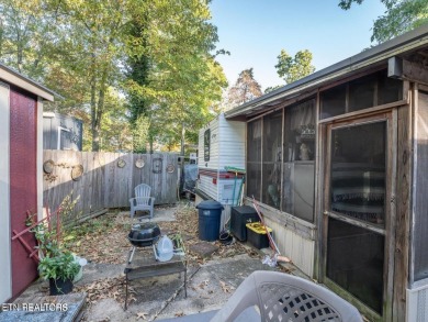 This charming property offers a newer washer and dryer, a on Lake Tansi Village Country Club in Tennessee - for sale on GolfHomes.com, golf home, golf lot