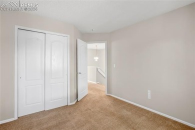 Experience the charm of this delightful end-unit townhome in the on Valley Hi Golf Course in Colorado - for sale on GolfHomes.com, golf home, golf lot