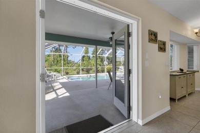 A GOLFER'S DREAM HOME! This updated pool home in Rotonda West on Rotonda Golf and Country Club - Long Marsh  in Florida - for sale on GolfHomes.com, golf home, golf lot