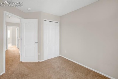 Experience the charm of this delightful end-unit townhome in the on Valley Hi Golf Course in Colorado - for sale on GolfHomes.com, golf home, golf lot