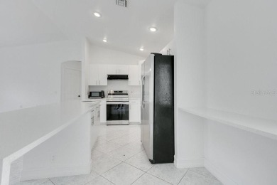 Under contract-accepting backup offers. Move-in Ready Charming 4 on Bobcat Trail Golf Club in Florida - for sale on GolfHomes.com, golf home, golf lot