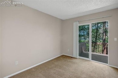 Experience the charm of this delightful end-unit townhome in the on Valley Hi Golf Course in Colorado - for sale on GolfHomes.com, golf home, golf lot