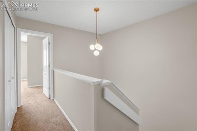 Experience the charm of this delightful end-unit townhome in the on Valley Hi Golf Course in Colorado - for sale on GolfHomes.com, golf home, golf lot