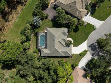 Nestled within the serene, winding streets of the sought-after on Calusa Lakes Golf Club in Florida - for sale on GolfHomes.com, golf home, golf lot