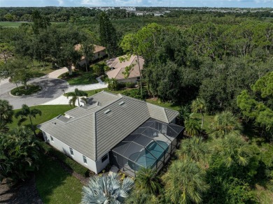 Nestled within the serene, winding streets of the sought-after on Calusa Lakes Golf Club in Florida - for sale on GolfHomes.com, golf home, golf lot