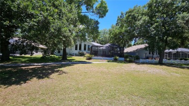 Nestled among the Ancient Oaks of Valrico along the 16th Fairway on Bloomingdale Golfers Club in Florida - for sale on GolfHomes.com, golf home, golf lot