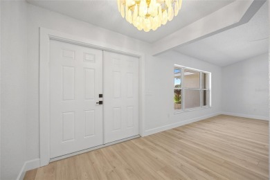 DEEP CREEK! STUNNING REMODELED 3-BEDROOM, 2.5-BATH, 2-CAR GARAGE on Deep Creek Golf Club in Florida - for sale on GolfHomes.com, golf home, golf lot