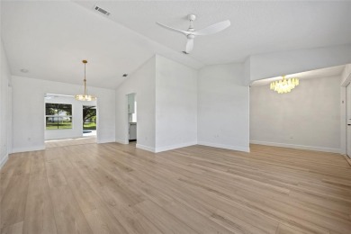 DEEP CREEK! STUNNING REMODELED 3-BEDROOM, 2.5-BATH, 2-CAR GARAGE on Deep Creek Golf Club in Florida - for sale on GolfHomes.com, golf home, golf lot