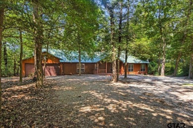 Discover peaceful East Texas living in this spacious 3,052 sq ft on Holly Lake Ranch Golf Club in Texas - for sale on GolfHomes.com, golf home, golf lot