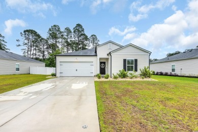Welcome to this beautifully maintained 4-bedroom, 2-bathroom on Legends Golf Club in South Carolina - for sale on GolfHomes.com, golf home, golf lot