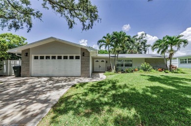Welcome to this stunning renovated 4-bedroom, 3-bathroom pool on The Dunedin Country Club in Florida - for sale on GolfHomes.com, golf home, golf lot