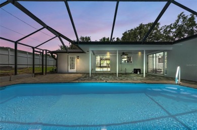 Welcome to this stunning renovated 4-bedroom, 3-bathroom pool on The Dunedin Country Club in Florida - for sale on GolfHomes.com, golf home, golf lot
