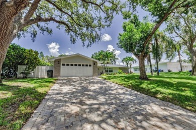 Welcome to this stunning renovated 4-bedroom, 3-bathroom pool on The Dunedin Country Club in Florida - for sale on GolfHomes.com, golf home, golf lot