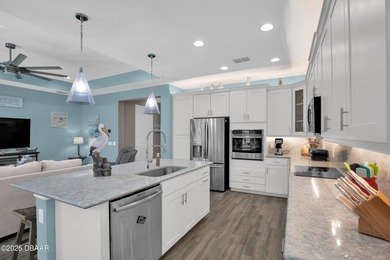 Discover this beautiful Coconut pool home in desirable Phase 1 on LPGA International Golf Course in Florida - for sale on GolfHomes.com, golf home, golf lot