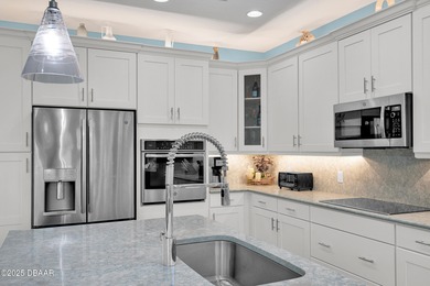 Discover this beautiful Coconut pool home in desirable Phase 1 on LPGA International Golf Course in Florida - for sale on GolfHomes.com, golf home, golf lot