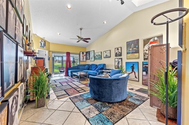 This beautiful 2-bedroom, 2-bath townhome features vaulted on Woodmont Country Club in Florida - for sale on GolfHomes.com, golf home, golf lot