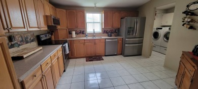 Located in a 55+ manufactured home resort-style golf community on Big Cypress Golf and Country Club in Florida - for sale on GolfHomes.com, golf home, golf lot