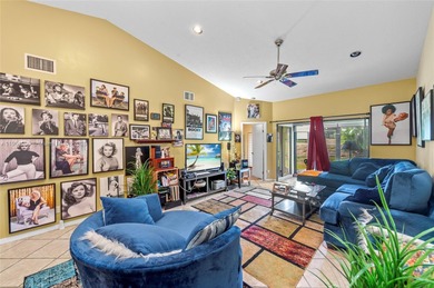 This beautiful 2-bedroom, 2-bath townhome features vaulted on Woodmont Country Club in Florida - for sale on GolfHomes.com, golf home, golf lot