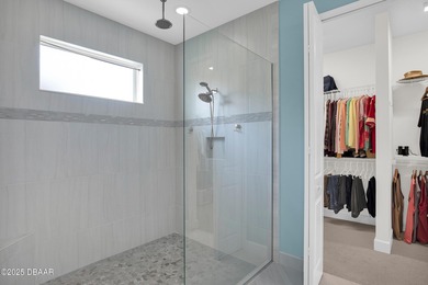 Discover this beautiful Coconut pool home in desirable Phase 1 on LPGA International Golf Course in Florida - for sale on GolfHomes.com, golf home, golf lot