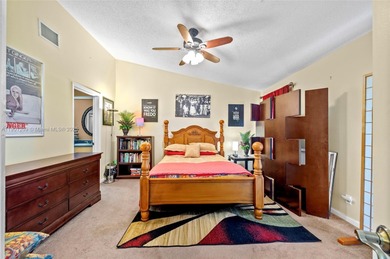 This beautiful 2-bedroom, 2-bath townhome features vaulted on Woodmont Country Club in Florida - for sale on GolfHomes.com, golf home, golf lot