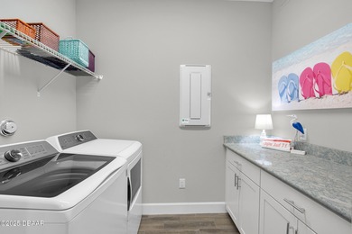 Discover this beautiful Coconut pool home in desirable Phase 1 on LPGA International Golf Course in Florida - for sale on GolfHomes.com, golf home, golf lot