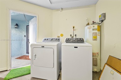 This beautiful 2-bedroom, 2-bath townhome features vaulted on Woodmont Country Club in Florida - for sale on GolfHomes.com, golf home, golf lot