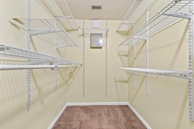 This beautiful 2-bedroom, 2-bath townhome features vaulted on Woodmont Country Club in Florida - for sale on GolfHomes.com, golf home, golf lot