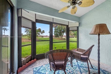 This beautiful 2-bedroom, 2-bath townhome features vaulted on Woodmont Country Club in Florida - for sale on GolfHomes.com, golf home, golf lot