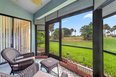This beautiful 2-bedroom, 2-bath townhome features vaulted on Woodmont Country Club in Florida - for sale on GolfHomes.com, golf home, golf lot