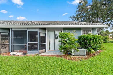 This beautiful 2-bedroom, 2-bath townhome features vaulted on Woodmont Country Club in Florida - for sale on GolfHomes.com, golf home, golf lot