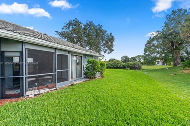 This beautiful 2-bedroom, 2-bath townhome features vaulted on Woodmont Country Club in Florida - for sale on GolfHomes.com, golf home, golf lot