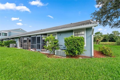 This beautiful 2-bedroom, 2-bath townhome features vaulted on Woodmont Country Club in Florida - for sale on GolfHomes.com, golf home, golf lot