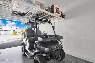 Discover this beautiful Coconut pool home in desirable Phase 1 on LPGA International Golf Course in Florida - for sale on GolfHomes.com, golf home, golf lot