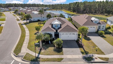 Discover this beautiful Coconut pool home in desirable Phase 1 on LPGA International Golf Course in Florida - for sale on GolfHomes.com, golf home, golf lot