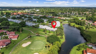 This beautiful 2-bedroom, 2-bath townhome features vaulted on Woodmont Country Club in Florida - for sale on GolfHomes.com, golf home, golf lot
