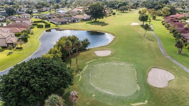 This beautiful 2-bedroom, 2-bath townhome features vaulted on Woodmont Country Club in Florida - for sale on GolfHomes.com, golf home, golf lot