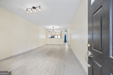 Charming  2-story townhome located in Little Suwanee Pointe on Collins Hill Golf Club in Georgia - for sale on GolfHomes.com, golf home, golf lot