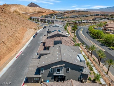 Nestled within a picturesque embrace of a serene lake and golf on Reflection Bay Golf Club in Nevada - for sale on GolfHomes.com, golf home, golf lot