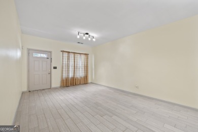 Charming  2-story townhome located in Little Suwanee Pointe on Collins Hill Golf Club in Georgia - for sale on GolfHomes.com, golf home, golf lot