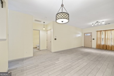 Charming  2-story townhome located in Little Suwanee Pointe on Collins Hill Golf Club in Georgia - for sale on GolfHomes.com, golf home, golf lot