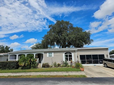 Nearly 2000 ft of living space, 3 bedrooms. 2 full baths, a on Southport Springs Golf Club in Florida - for sale on GolfHomes.com, golf home, golf lot