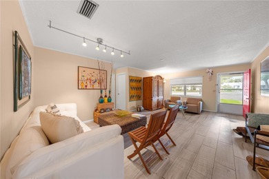 Beautifully maintained 2-bedroom, 2-bath Extended Montgomery on On Top of the World Golf Course in Florida - for sale on GolfHomes.com, golf home, golf lot