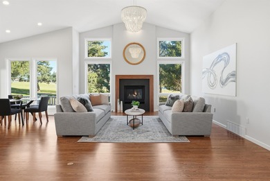 Live steps from the fairways in this Meadowwood home, set in a on Liberty Lake Golf Club in Washington - for sale on GolfHomes.com, golf home, golf lot