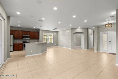 Step into this stunning lakefront smart home nestled in the on LPGA International Golf Course in Florida - for sale on GolfHomes.com, golf home, golf lot