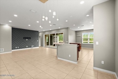 Step into this stunning lakefront smart home nestled in the on LPGA International Golf Course in Florida - for sale on GolfHomes.com, golf home, golf lot