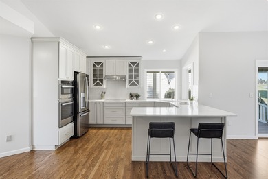 Live steps from the fairways in this Meadowwood home, set in a on Liberty Lake Golf Club in Washington - for sale on GolfHomes.com, golf home, golf lot