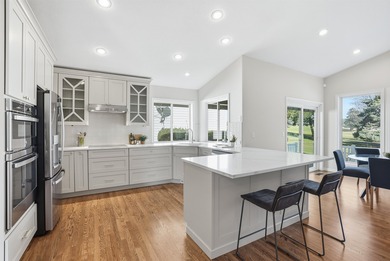 Live steps from the fairways in this Meadowwood home, set in a on Liberty Lake Golf Club in Washington - for sale on GolfHomes.com, golf home, golf lot