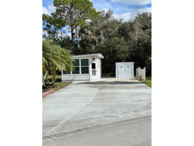 Located in an exclusive gated community with a championship on The Great Outdoors Golf and Country Club in Florida - for sale on GolfHomes.com, golf home, golf lot